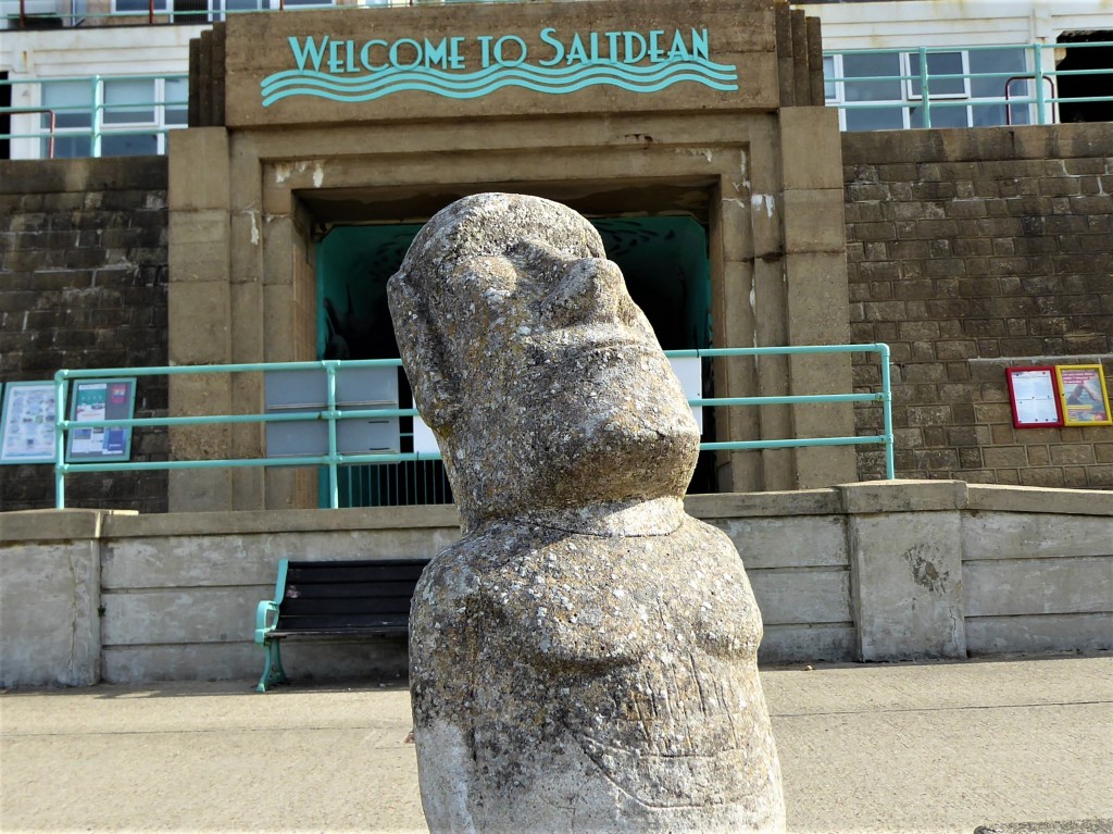 Moai meets the Welcome to Saltdean sign